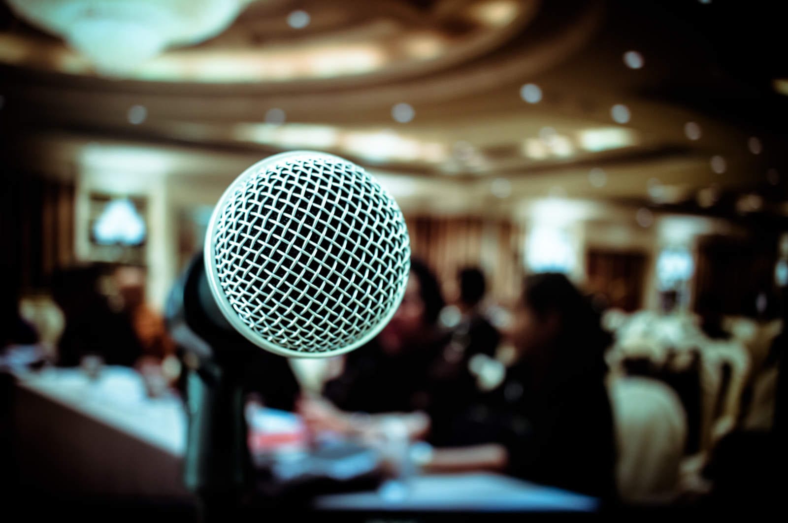 An image of a microphone as an example of tips for recording an interview.