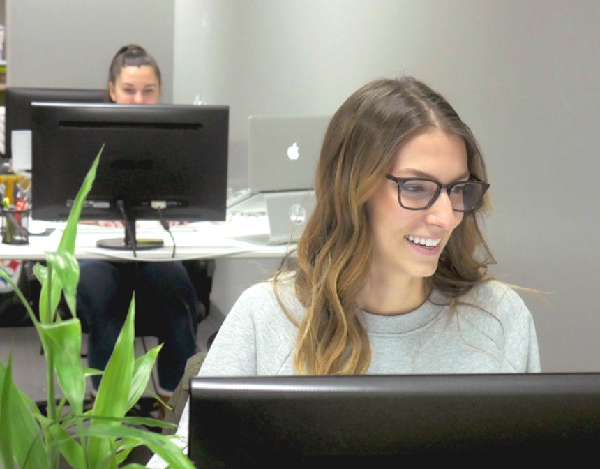 TrackFive staff working on projects