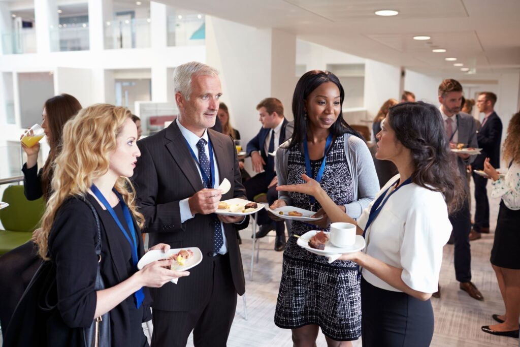 Businesspeople interacting at a networking event
